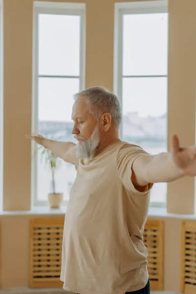 Stretching arms and shoulders man.